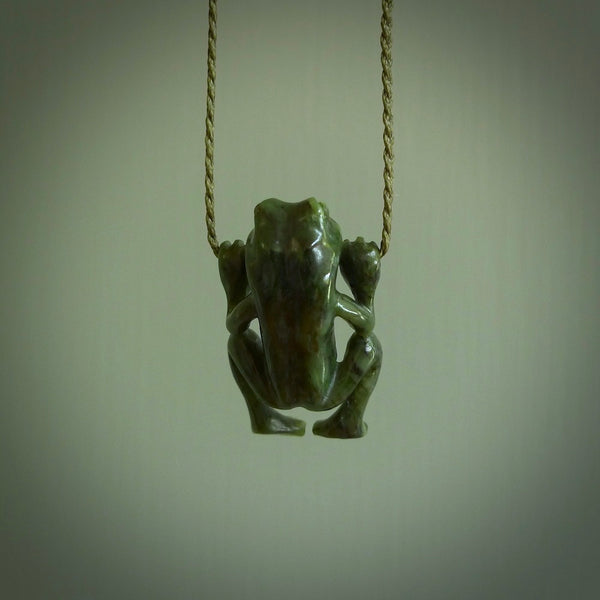 Hand carved frog pendant. Carved in nephrite jade by NZ Pacific. Real jade necklaces and pendants for sale online.