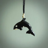 Hand carved black jade Orca pendant. Ocean themed pendants hand carved from natural materials by NZ Pacific. Unique handmade jewellery.