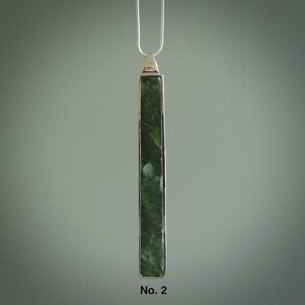 Hand carved New Zealand jade drop pendants with Sterling Silver. Contemporary drop necklaces that are hand made and will make fashionable statements around your neck. These beautiful Jade drops are in a sterling silver encasing. For sale by NZ Pacific and shipped free worldwide.