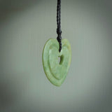 A large hand-carved Jade heart pendant. These are lovely pendants carved from exquisite New Zealand pounamu. Free worldwide delivery. Delivered to you on an adjustable cord.