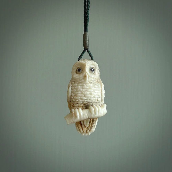A traditional Owl design carving, hand made for us from deer antler, bone. This is a work of art and is a collectable piece of traditional bone carving. It can be worn as a special piece of jewellery or displayed. This is art made to wear at its finest.
