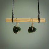 These earrings are beautifully hand made with gorgeous flair. They are fashionable and perfect for a women with style. Hand carved from a gorgeous piece of New Zealand Marsden jade with Gold leaf and gold plated hoops - they are elegant and beautiful.