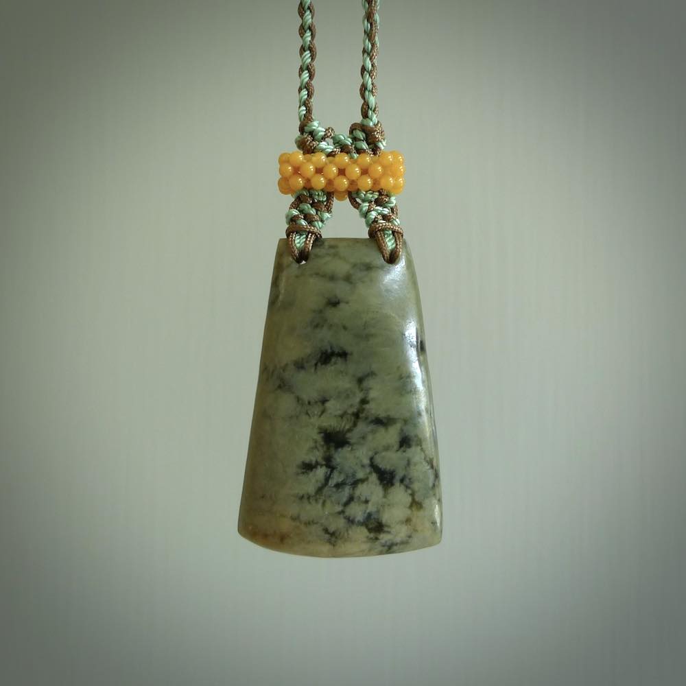 Hand carved New Zealand Jade pendant with adjustable cord. This piece is a stand out work of creativity and skill and we love Jen Hung's creations. Unique, one only, New Zealand made necklace for sale. Free shipping worldwide.