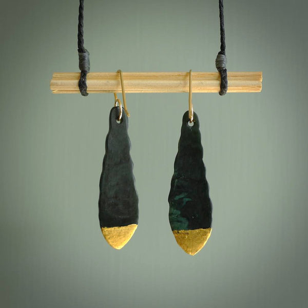 These leaf earrings are beautifully hand made with gorgeous flair. They are fashionable and perfect for a women with style. Hand carved from a gorgeous piece of New Zealand Marsden jade with Gold leaf inlay and gold plated hooks - they are elegant and beautiful.