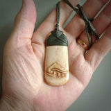 A hand carved deer antler toki with NZ Pacific logo engraving. These have been stained with our home made tea dye. Unique hand made jewellery from New Zealand Pacific.