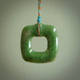 Hand carved jade pendant. Carved by NZ Pacific from New Zealand jade. This is a modern, contemporary pendant made from natural materials.