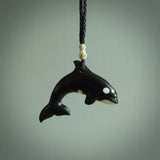 Hand carved black jade Orca pendant. Ocean themed pendants hand carved from natural materials by NZ Pacific. Unique handmade jewellery.