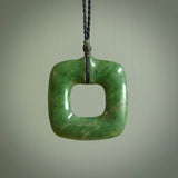 Hand carved jade pendant. Carved by NZ Pacific from New Zealand jade. This is a modern, contemporary pendant made from natural materials.