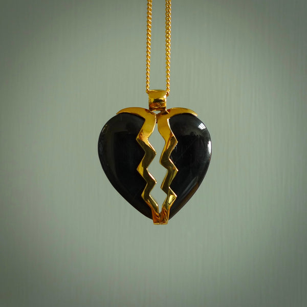 This is a handcarved love heart pendant made from a gorgeous and striking piece of Black Jade with gold plated silver. This is a superbly carved and very unique piece if custom jewellery. For sale online from NZ Pacific.
