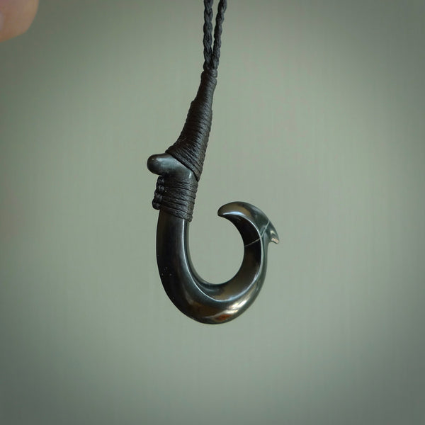 These pendants are hand carved, black jade Hawaiian hooks or Makau pendants. They are beautifully finished in a high polish and bound with a black cord and necklace. Hand made jewellery that make the most wonderful gifts. Free shipping worldwide.