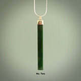 Hand carved New Zealand jade drop pendant with a sterling silver cap and chain.