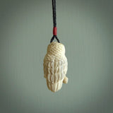 A traditional Owl design carving, hand made for us from deer antler, bone. This is a work of art and is a collectable piece of traditional bone carving. It can be worn as a special piece of jewellery or displayed. This is art made to wear at its finest.