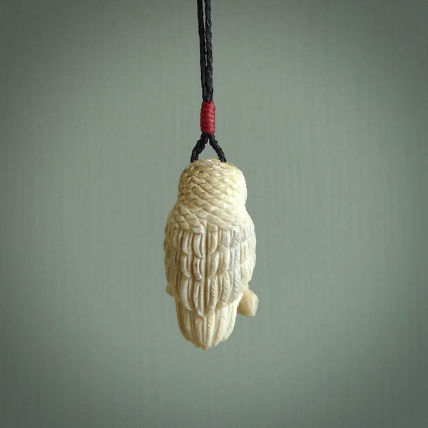 A traditional Owl design carving, hand made for us from deer antler, bone. This is a work of art and is a collectable piece of traditional bone carving. It can be worn as a special piece of jewellery or displayed. This is art made to wear at its finest.