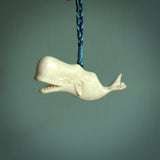 Hand carved whale pendant, carved by us. This piece is carved from cow bone and is a fantastic depiction of these giants of the deep. This particular piece is a humpback whale design and is lovingly carved. New Zealand made whale pendant from bone.