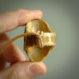 Hand carved Hannya mask ring. Made from Red Deer antler in New Zealand. Unique Hannya Play Mask ring hand made from deer antler by master bone carver Fumio Noguchi. Spectacular collectable work of art, made to wear. One only ring, delivered to you at no extra cost with express courier.