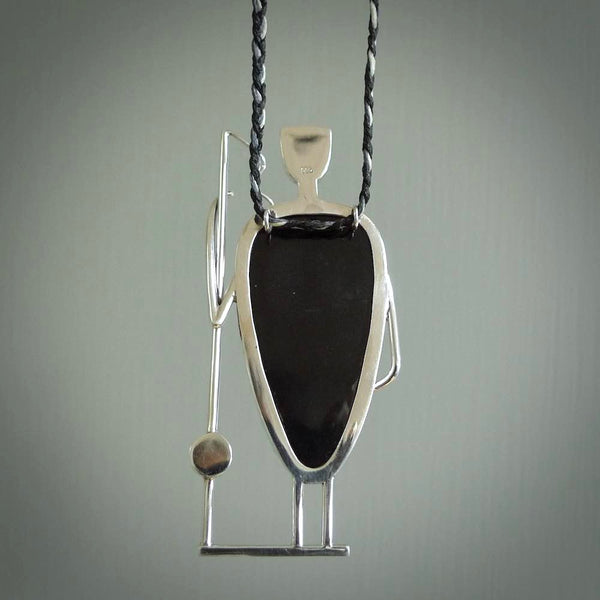 This is a very cool and creative fisherman hand made from Australian Black Jade and Sterling Silver. A fisherman who had caught a fish pendant hand crafted from sterling silver with Black Jade torso. A spectacular piece of art to wear.