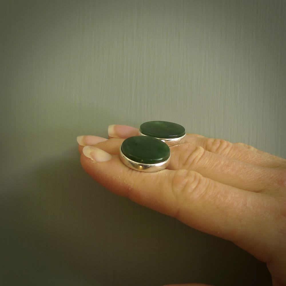 Hand made fashionable cufflinks from New Zealand Jade and sterling silver. Hand crafted here in New Zealand. Hand made art to wear from New Zealand Jade and Sterling Silver. A one off pair of classy cufflinks for men. Online shopping made easy.