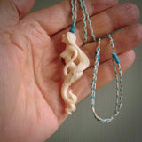 This pendant is a gorgeous and intricately carved mermaid and merman pendant. Carved by renowned bone carver Yuri Terenyi for us, this is a little masterpiece. The craftsmanship displayed in this piece is extraordinary - a collectors item, or a piece to wear and love.