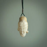 A traditional Owl design carving, hand made for us from deer antler, bone. This is a work of art and is a collectable piece of traditional bone carving. It can be worn as a special piece of jewellery or displayed. This is art made to wear at its finest.