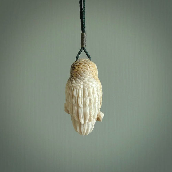 A traditional Owl design carving, hand made for us from deer antler, bone. This is a work of art and is a collectable piece of traditional bone carving. It can be worn as a special piece of jewellery or displayed. This is art made to wear at its finest.