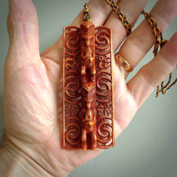 This large piece is a hand carved traditional stained bone pendant. Yuri Terenyi has carved this from Natural Bone. It is a beautiful and artistic piece of jewellery. One only necklace.