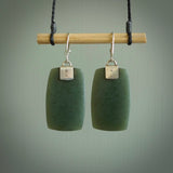 These are stunning large drop jade earrings carved in New Zealand by Josey Coyle. It is carved from a deep green piece of New Zealand Jade and with Sterling Silver hooks and findings.