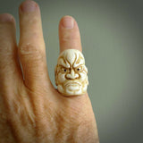 Hand carved Ni-Oh mask ring. Made from Red Deer antler in New Zealand. Unique Ni-Oh Mask ring hand made from deer antler by master bone carver Fumio Noguchi. Spectacular collectable work of art, made to wear. One only ring, delivered to you at no extra cost with express courier.