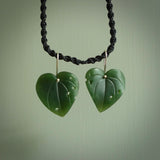 These are stunning heart shaped jade kawakawa leaf earrings carved in New Zealand by Josey Coyle. It is carved from a deep green piece of New Zealand Jade and with Sterling Silver hooks.