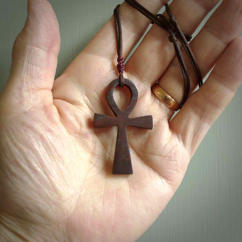 Red Jasper Stone ankh cross pendant. Handmade jade jewellery made by NZ Pacific and for sale online. Jasper stone ankh cross for men and women. Unique art to wear from NZ Pacific.
