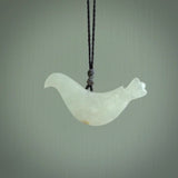 This pendant is a hand carved contemporary dove bird pendant. Carved in jadeite stone. It is a finely shaped piece with gentle and soft lines and is a great representation of the peace that doves traditionally represent. We ship these worldwide with DHL express courier. A fantastic and meaningful gift.