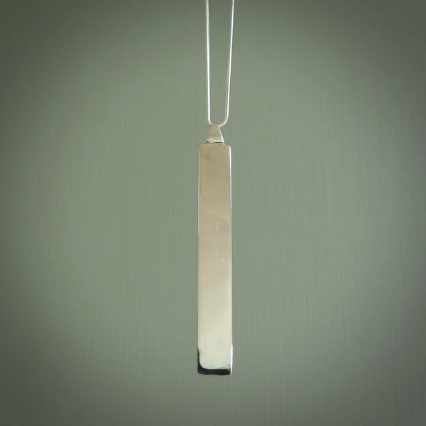 Hand carved New Zealand jade drop pendants with Sterling Silver. Contemporary drop necklaces that are hand made and will make fashionable statements around your neck. These beautiful Jade drops are in a sterling silver encasing. For sale by NZ Pacific and shipped free worldwide.