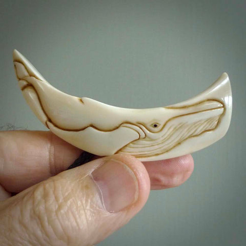 Hand carved incredible Boars Tusk whale  carving. A stunning work of art. This pendant was hand carved in pigs tusk with whale engraving by Fumio Noguchi. A one off collectors item that has been hand crafted to be worn or displayed.
