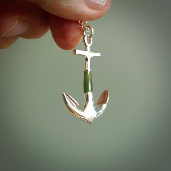 ANCHORED BY ME  A beautifully carved anchor for lovers of the ocean!  We have hand made this in New Zealand Jade paired with beautiful Sterling Silver.   A wonderful, mottled green stone with dark inclusions - the look of a well-used anchor.