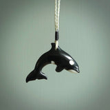 Hand carved black jade Orca pendant. Ocean themed pendants hand carved from natural materials by NZ Pacific. Unique handmade jewellery.
