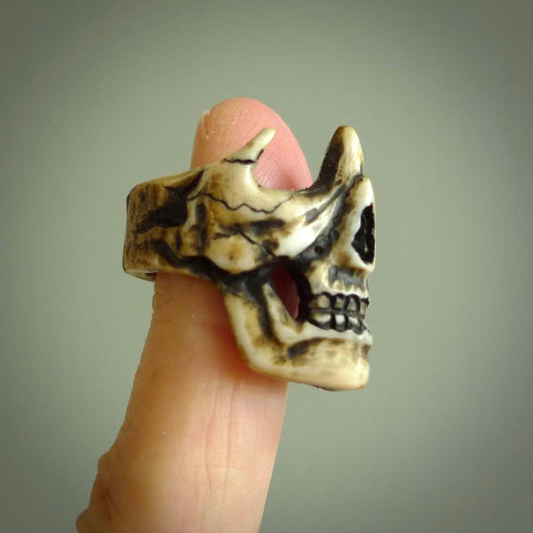 Hand carved broken skull ring. Made from Red Deer antler in New Zealand. Unique broken skull ring hand made from deer antler by master bone carver Fumio Noguchi. Spectacular collectable work of art, made to wear. One only ring, delivered to you at no extra cost with express courier.