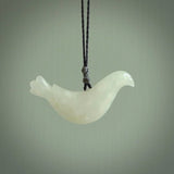 This pendant is a hand carved contemporary dove bird pendant. Carved in jadeite stone. It is a finely shaped piece with gentle and soft lines and is a great representation of the peace that doves traditionally represent. We ship these worldwide with DHL express courier. A fantastic and meaningful gift.