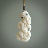 Hand carved tiki. Tiki Pendant made from cow bone by NZ Pacific. Ethnic handcarved jewellery for sale online.