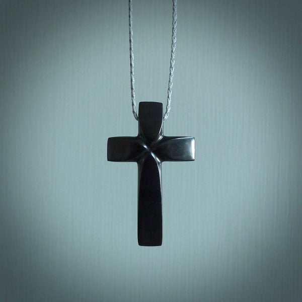 Hand carved black jade cross. Religious symbol pendant. Christian cross pendant for sale online.