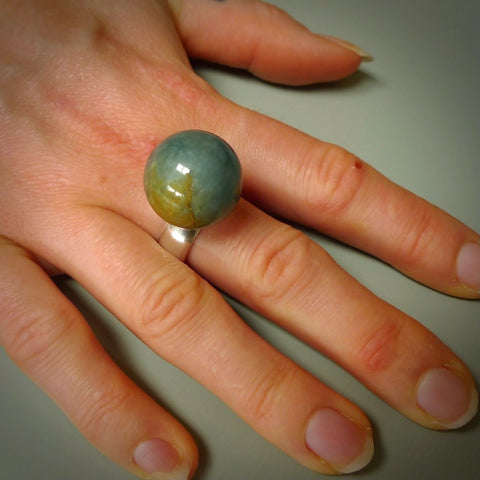Hand carved jade ball ring with sterling silver. Carved for NZ Pacific by Ana Krakosky here in New Zealand. Carved from real Guatemalan Jade and Sterling Silver. This is a one only ring available, delivered with DHL Express Courier.