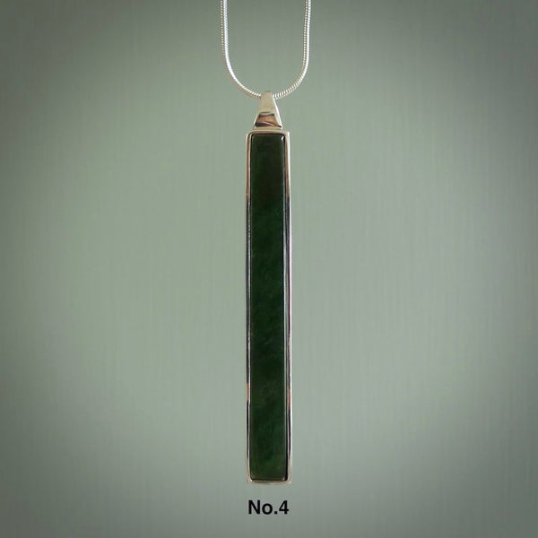 Hand carved New Zealand jade drop pendants with Sterling Silver. Contemporary drop necklaces that are hand made and will make fashionable statements around your neck. These beautiful Jade drops are in a sterling silver encasing. For sale by NZ Pacific and shipped free worldwide.