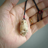 A traditional Owl design carving, hand made for us from deer antler, bone. This is a work of art and is a collectable piece of traditional bone carving. It can be worn as a special piece of jewellery or displayed. This is art made to wear at its finest.