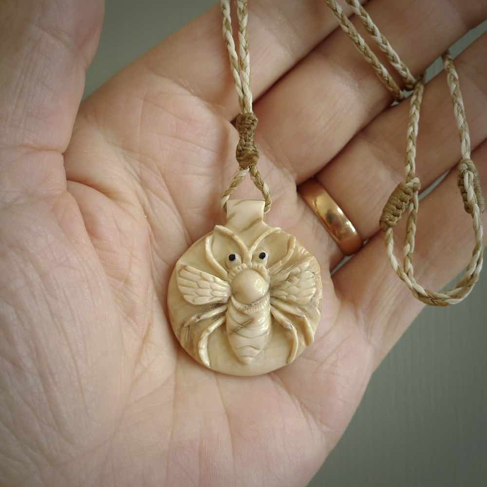 This is a handcarved pendant depicting a beetle on the front face. it is carved from Woolly Mammoth tusk and is a beautiful creamy, golden colour. A lovely and unique necklace for those of us who are fascinated with beetles.