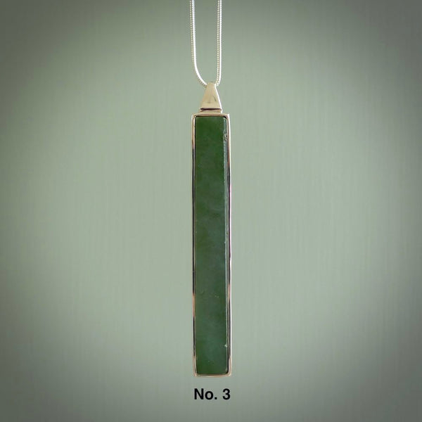 Hand carved New Zealand jade drop pendants with Sterling Silver. Contemporary drop necklaces that are hand made and will make fashionable statements around your neck. These beautiful Jade drops are in a sterling silver encasing. For sale by NZ Pacific and shipped free worldwide.