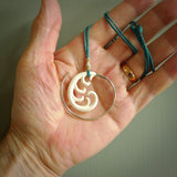 Hand carved pendants made from bone with sterling silver. NZ Pacific contemporary Koru pendants for sale online.