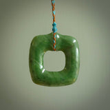 Hand carved jade pendant. Carved by NZ Pacific from New Zealand jade. This is a modern, contemporary pendant made from natural materials.
