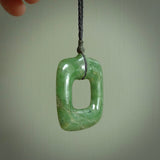 Hand carved jade pendant. Carved by NZ Pacific from New Zealand jade. This is a modern, contemporary pendant made from natural materials.