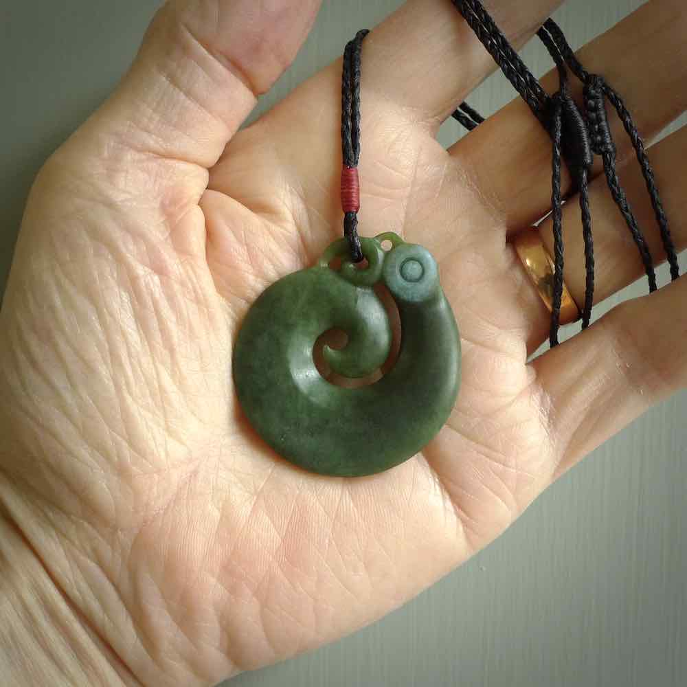 New Zealand Koru Manaia. Hand carved maori pendant. Made in New Zealand. Real Jade, pounamu.
