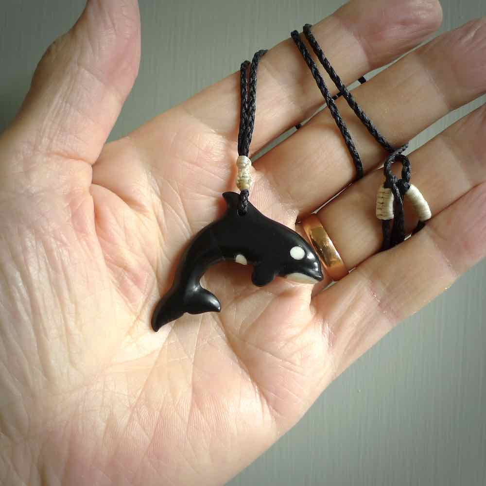 Hand carved black jade Orca pendant. Ocean themed pendants hand carved from natural materials by NZ Pacific. Unique handmade jewellery.