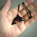 Hand carved black jade Orca pendant. Ocean themed pendants hand carved from natural materials by NZ Pacific. Unique handmade jewellery.