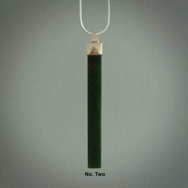 Hand carved New Zealand jade drop pendants with Sterling Silver. Contemporary drop necklaces that are hand made and will make fashionable statements around your neck. These beautiful Jade drops are with a sterling silver cap. For sale by NZ Pacific and shipped free worldwide.